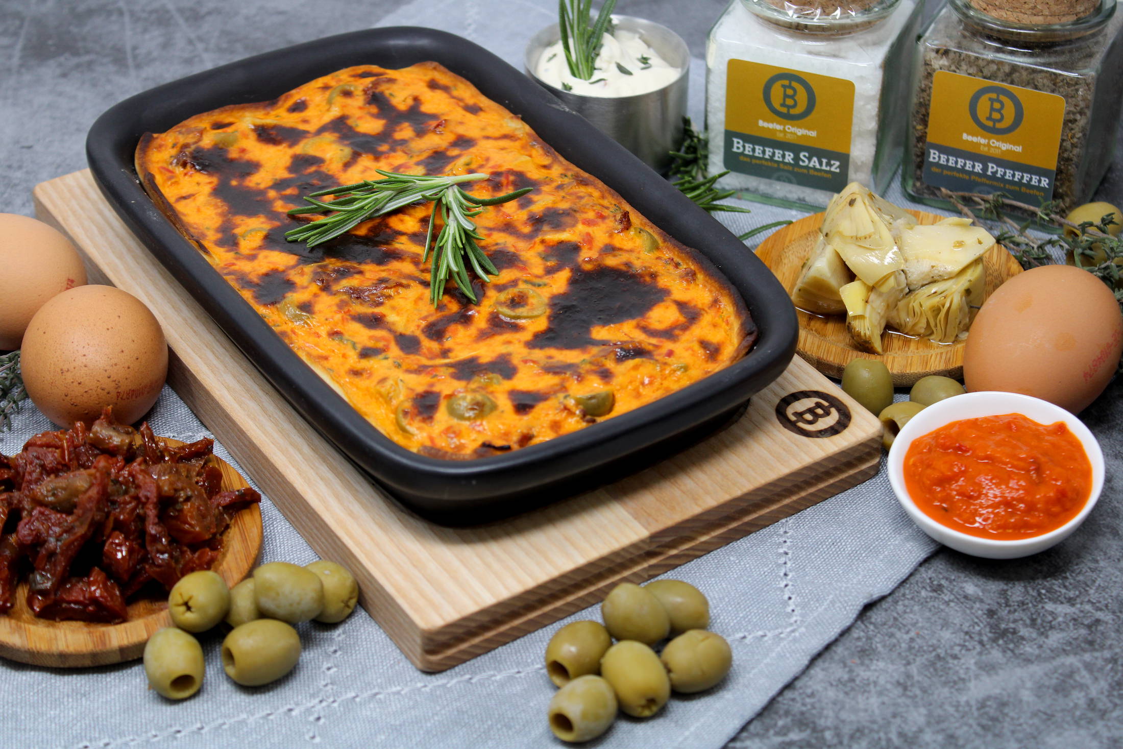 Quiche “Mediterran” mit getrockneten Tomaten, Artischocke und Olive